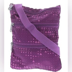 “Eddie Bauer” Purple Geometric Crossbody Bag featuring multi zipper compartments